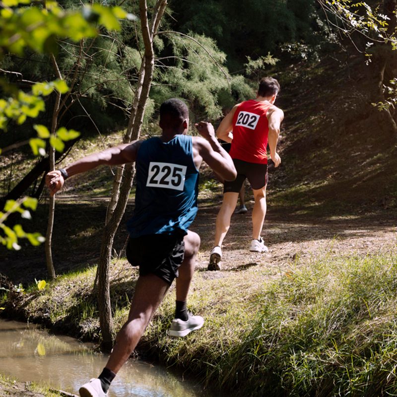Two runners on a trail